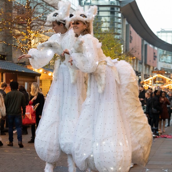 Snow Foxes Stilt Walkers